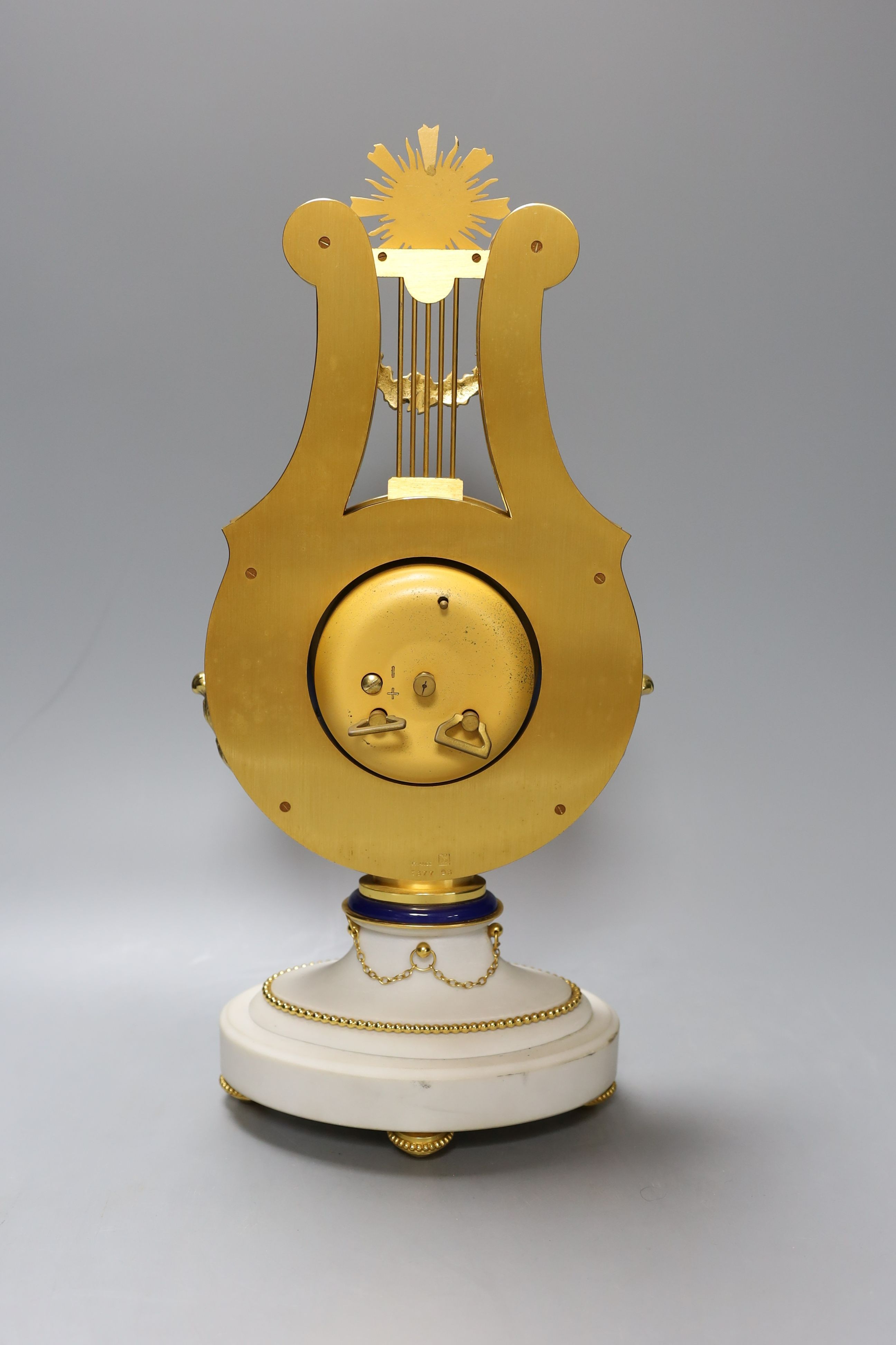 A French Empire-style lyre-shape mantel clock by Larigne, Paris, 38cm